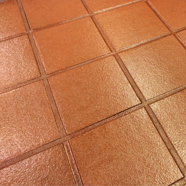 a close up of a Quarry tile floor sealed with GlazeGuard Plus anti slip non slip coating